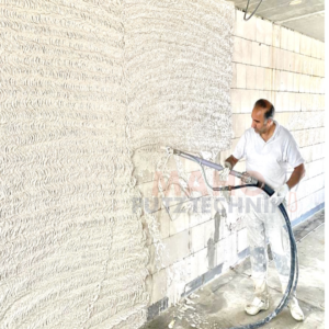 Putz-Spritbewurf mit Gipsputz und einem Verputzer